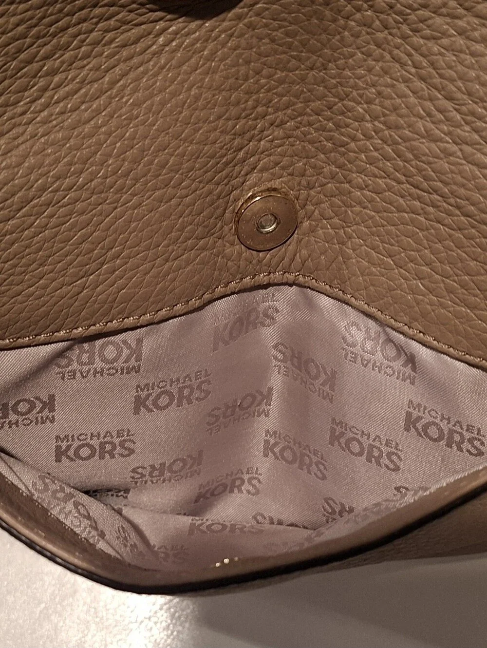 Michael Kors Beige Pebbled Leather Hobo with Tassel Charm